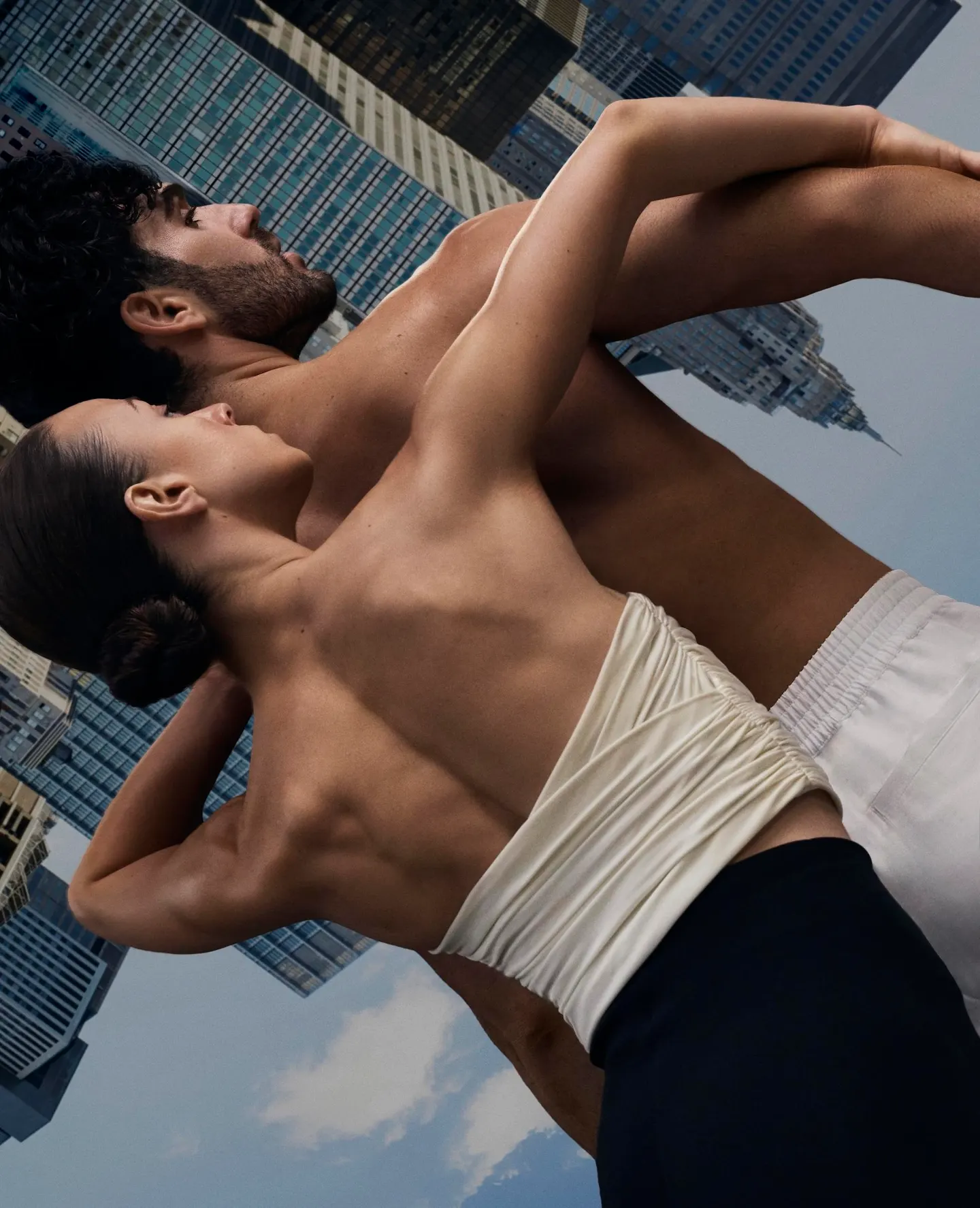 A dancer arched against the sky