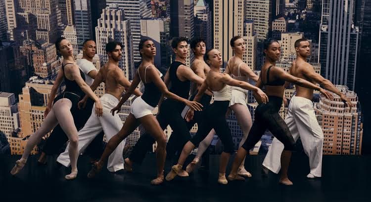 The company dancing on stage
