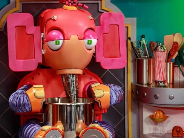 A puppet robot on the Bake Time set