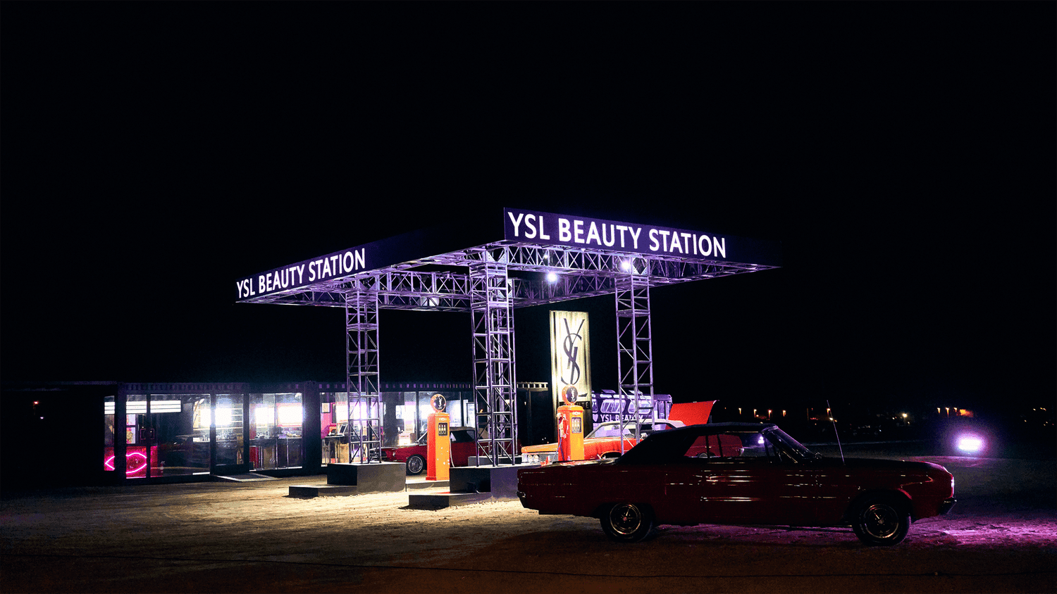 The YSL Beauty Station lit at night